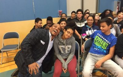 Green Bay Packers star William Henderson visits Longfellow Elementary School